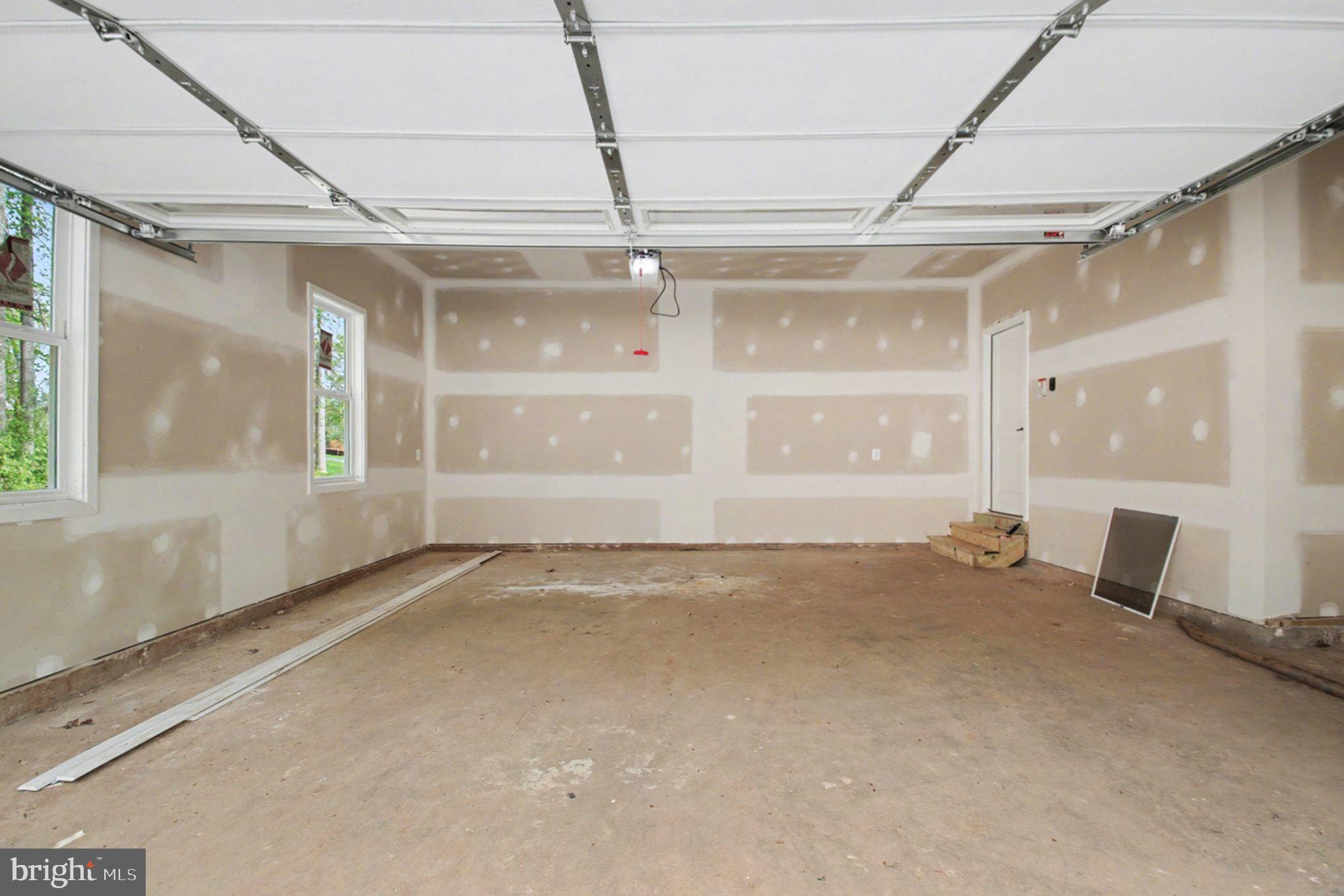 7253 Blackwell Road Warrenton, VA 20187 - Photo 33 of 41 Spacious garage ready for your vision.