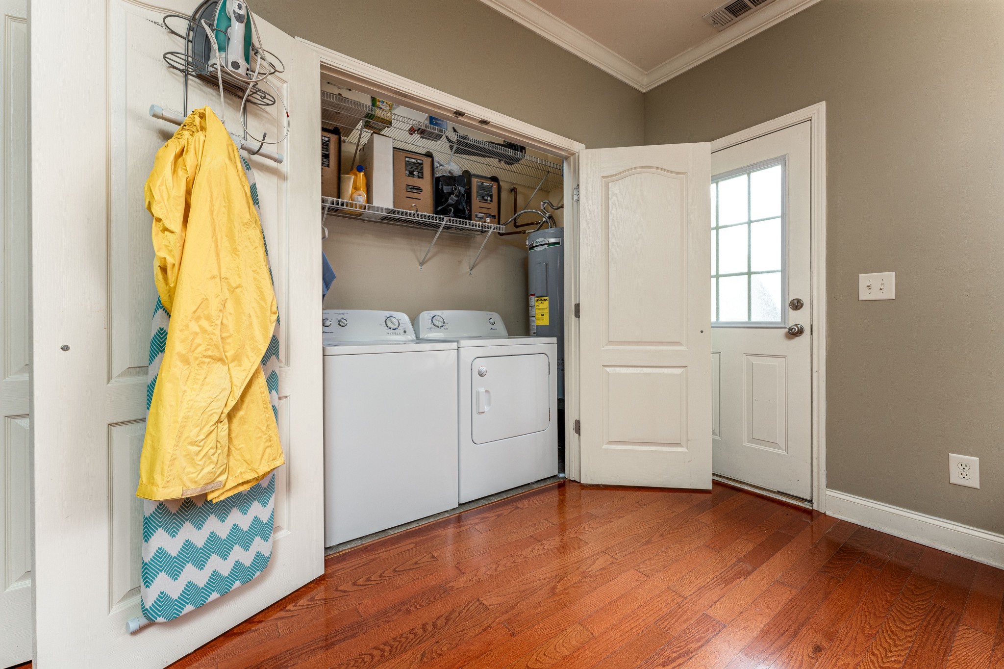 735 Tulip Grove Road, Unit 210 Hermitage, TN 37076 - Photo 11 of 32 a view of walk in closet with window and wooden floor