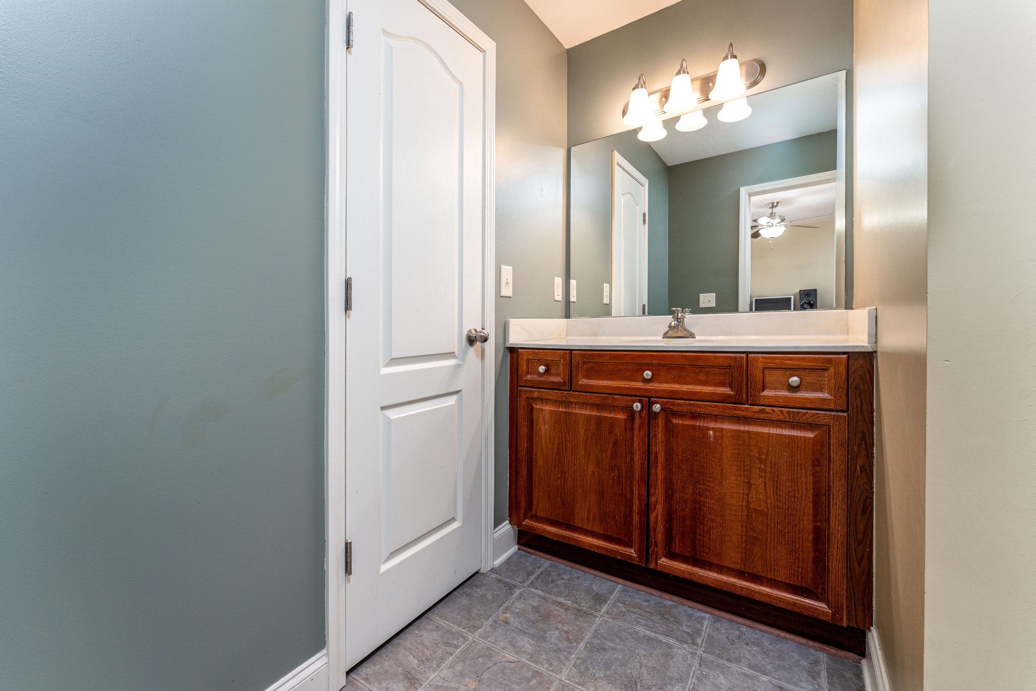 735 Tulip Grove Road, Unit 210 Hermitage, TN 37076 - Photo 20 of 32 a spacious bathroom with a double vanity and a mirror