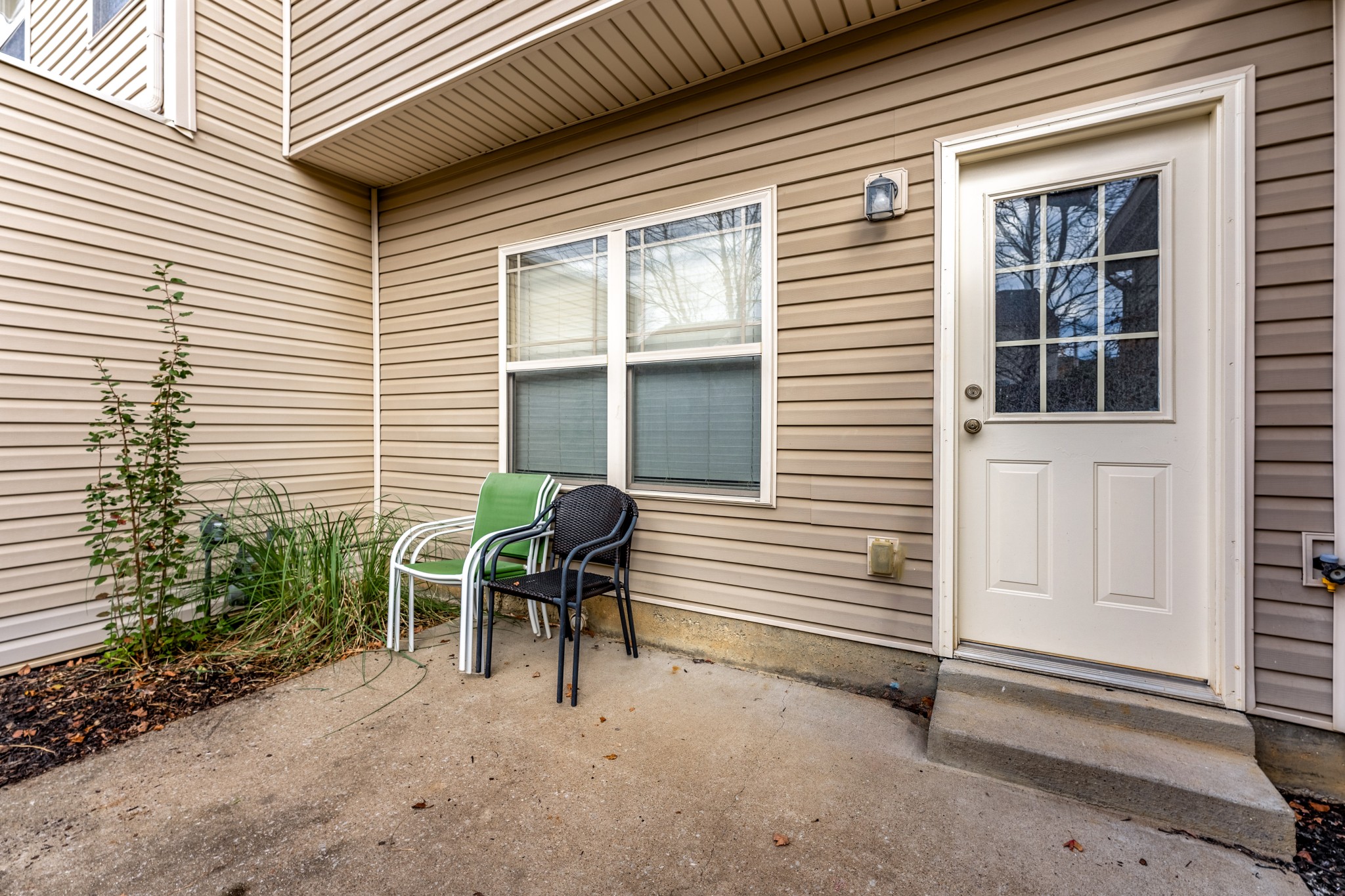735 Tulip Grove Road, Unit 210 Hermitage, TN 37076 - Photo 23 of 32 a house view with a outdoor seating space