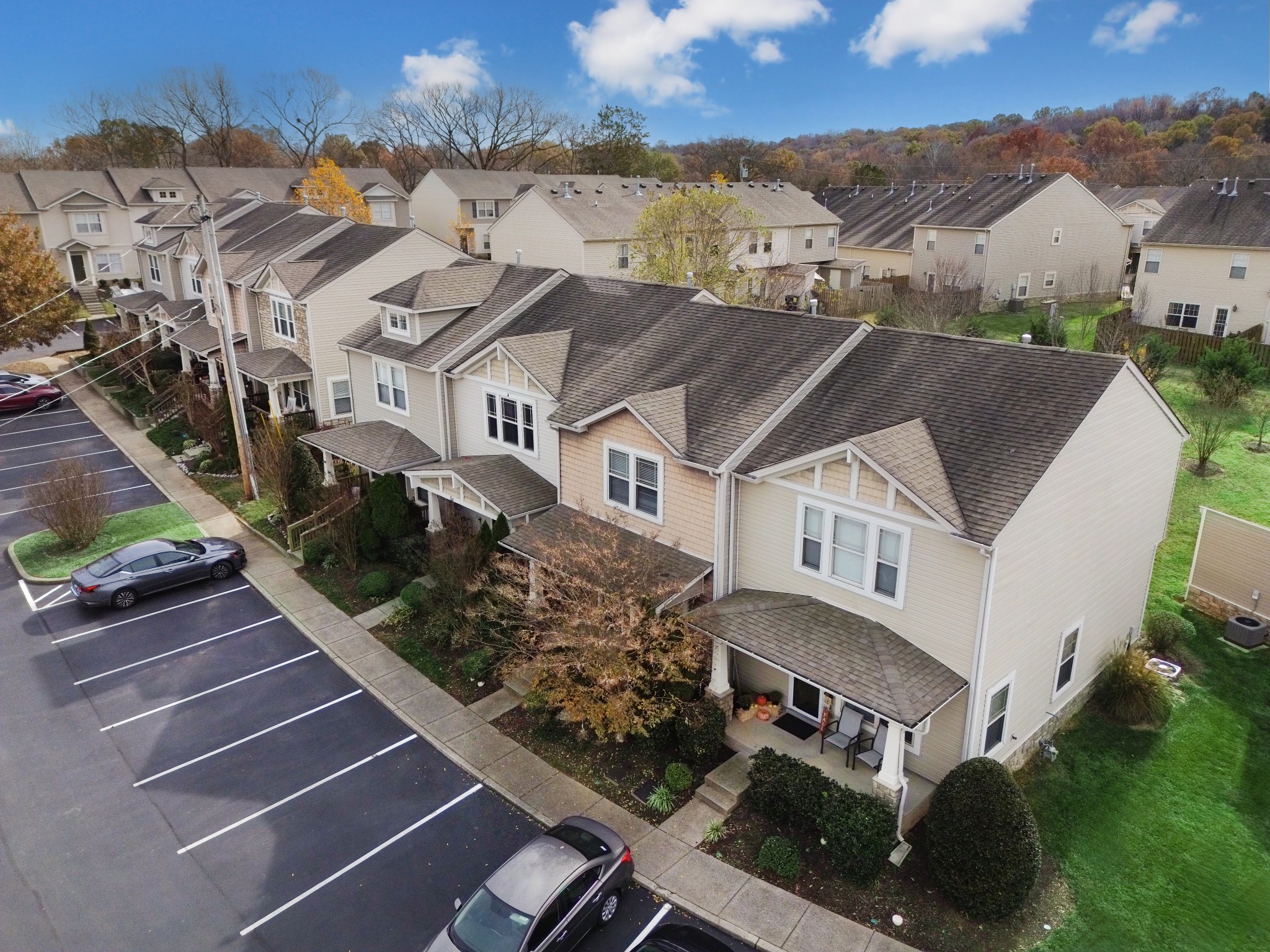 735 Tulip Grove Road, Unit 210 Hermitage, TN 37076 - Photo 26 of 32 an aerial view of multiple houses with a yard