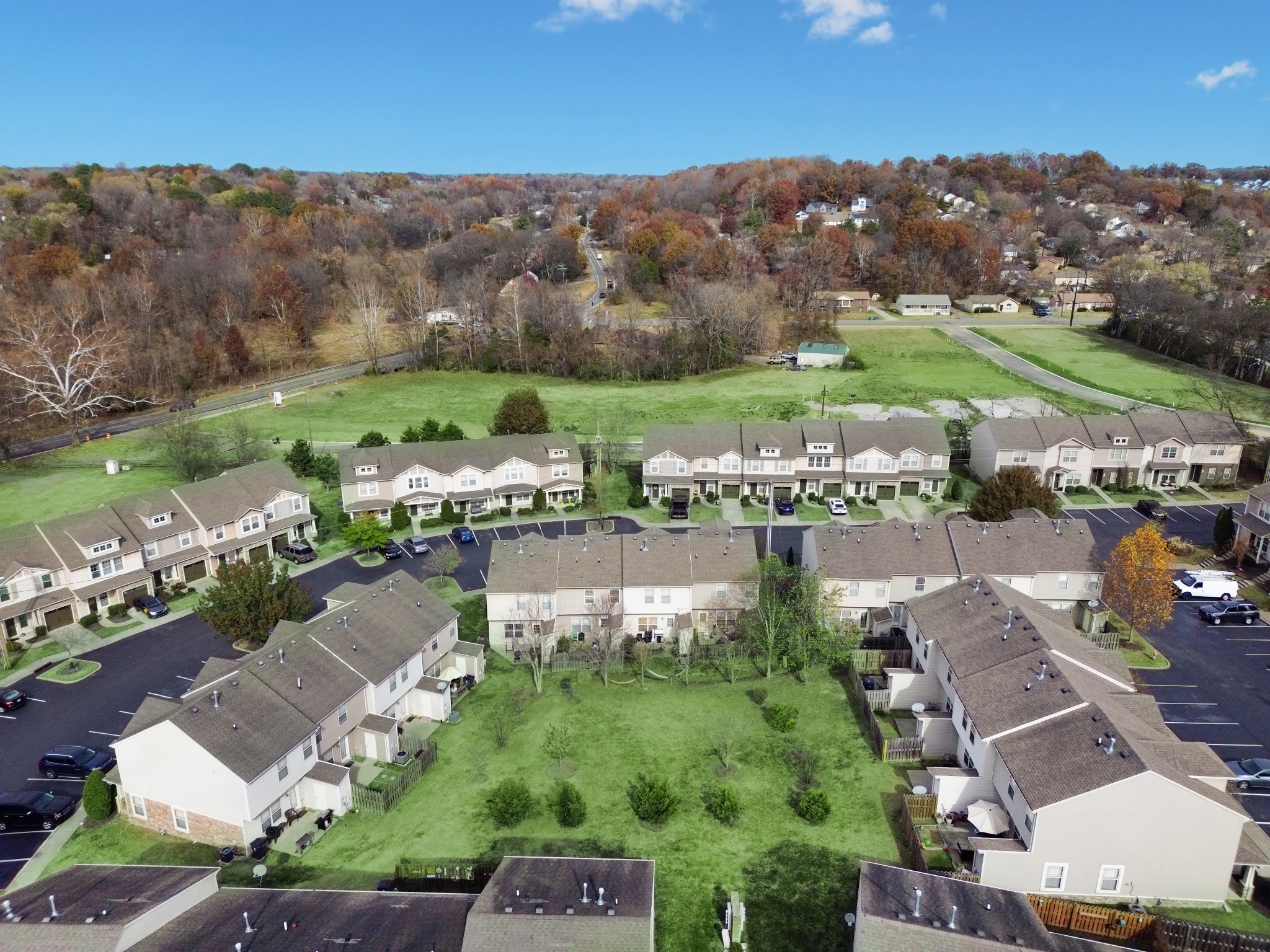 735 Tulip Grove Road, Unit 210 Hermitage, TN 37076 - Photo 28 of 32 an aerial view of residential houses with outdoor space and river