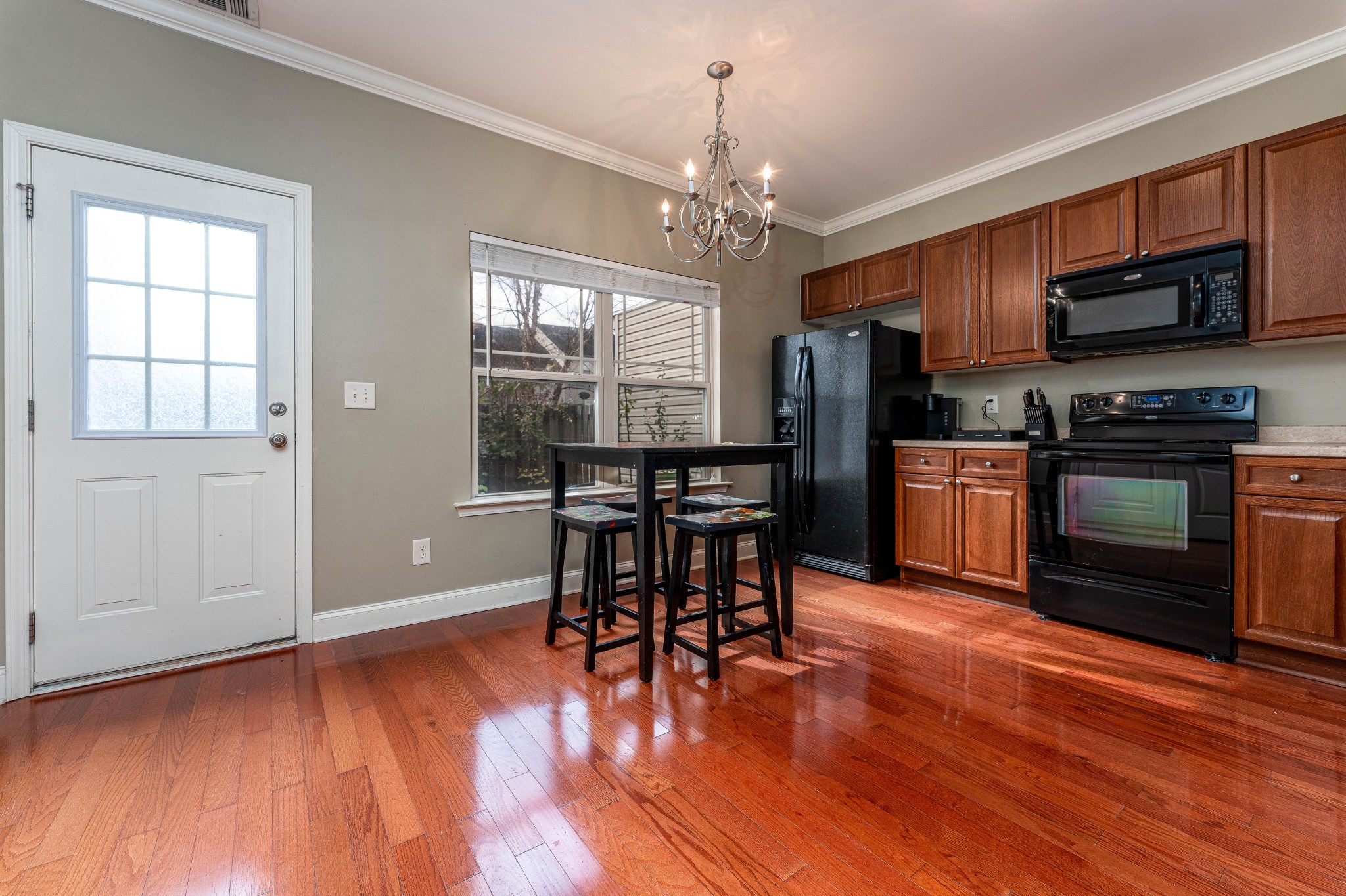 735 Tulip Grove Road, Unit 210 Hermitage, TN 37076 - Photo 8 of 32 a view of a dining room with furniture window and wooden floor