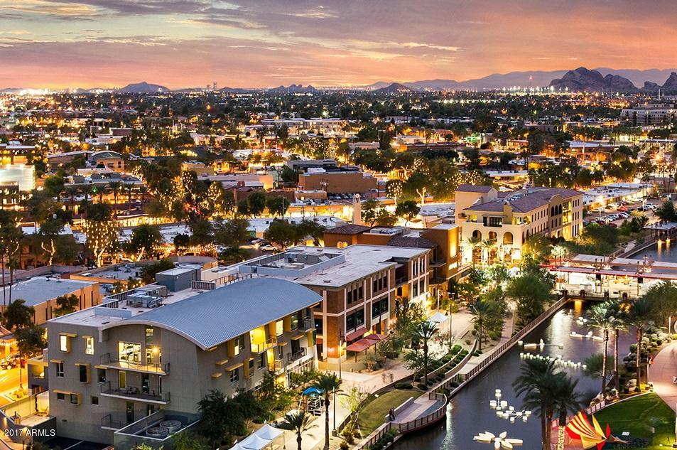 6909 East Osborn Road, Unit F Scottsdale, AZ 85251 - Photo 47 of 55 a view of a city with mountains in the background