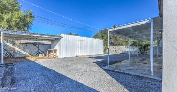 a view of a backyard space