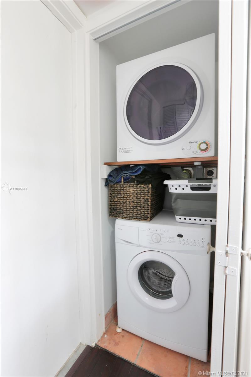 3034 Southwest 27th Avenue, Unit 4 Miami, FL 33133 - Photo 8 of 15 a utility room with dryer and washer