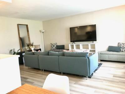 517 Fanshaw M Boca Raton, FL 33434 - Photo 3 of 11 a living room with furniture and a flat screen tv