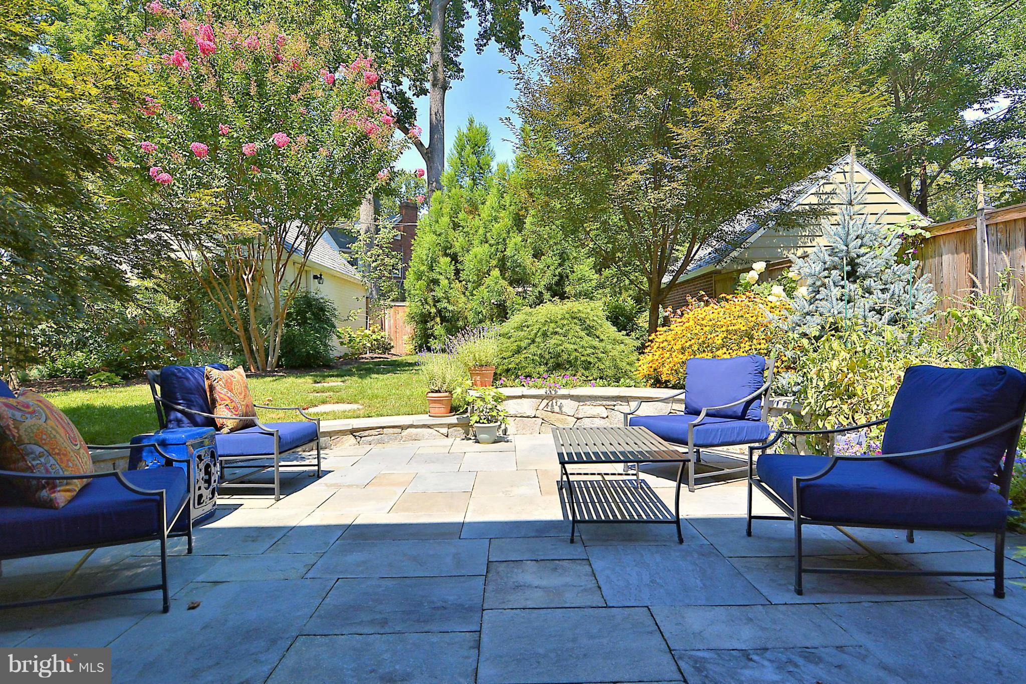 6428 Barnaby Street Northwest Washington, DC 20015 - Photo 11 of 30 Patio with sit wall and retractable awning