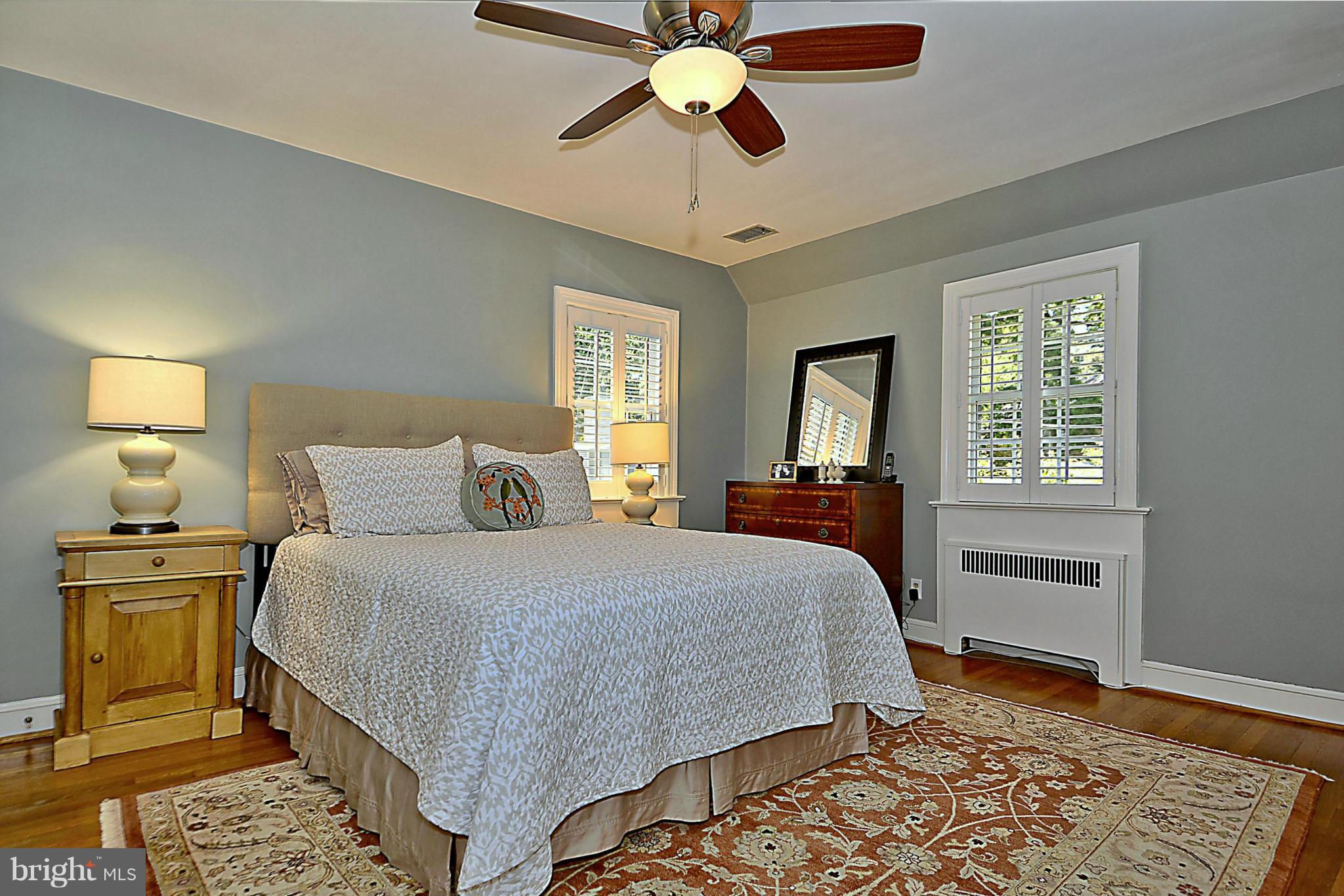 6428 Barnaby Street Northwest Washington, DC 20015 - Photo 17 of 30 Master BR w wood floors and ceiling fan light