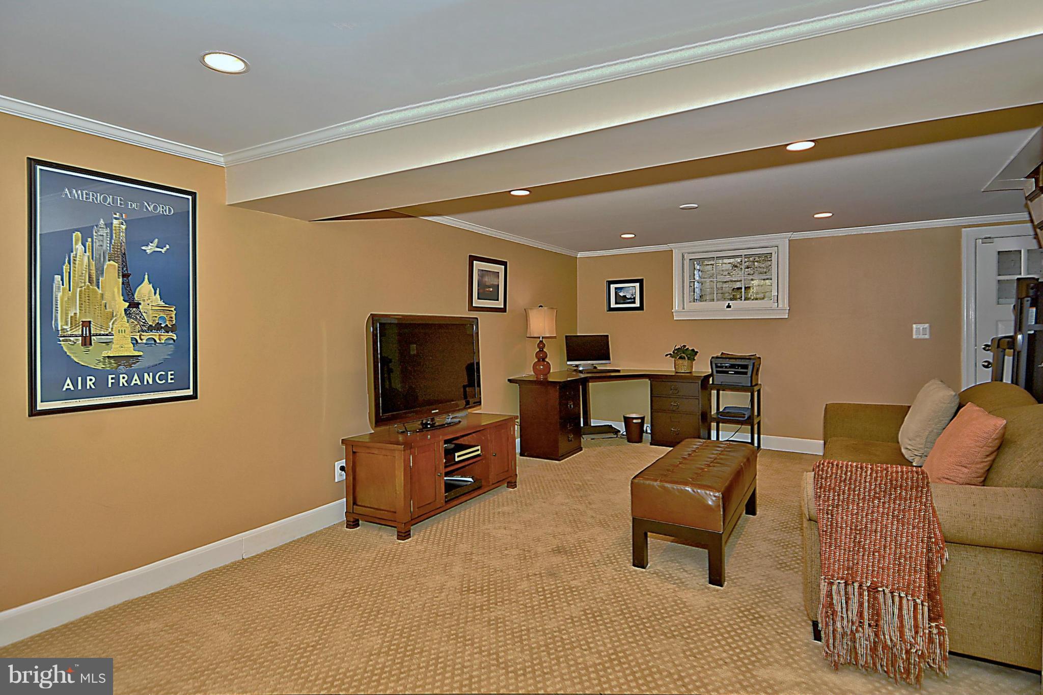 6428 Barnaby Street Northwest Washington, DC 20015 - Photo 24 of 30 Family Room w recessed lighting and walk out