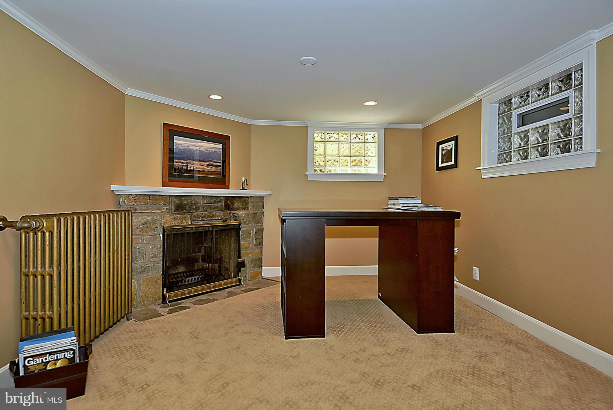 6428 Barnaby Street Northwest Washington, DC 20015 - Photo 26 of 30 Den / Office with stone front fireplace