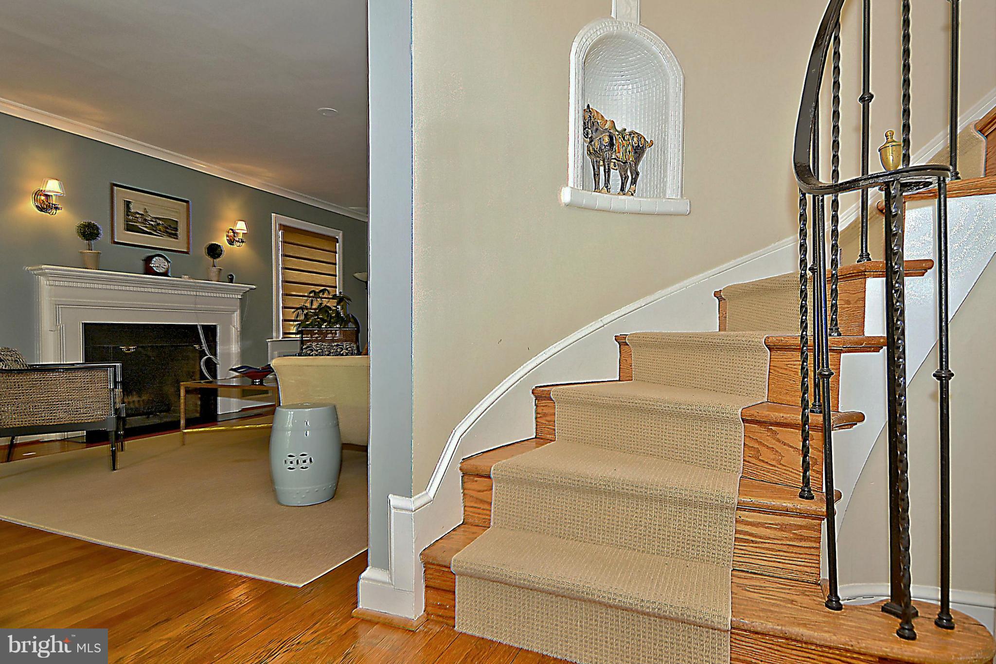 6428 Barnaby Street Northwest Washington, DC 20015 - Photo 5 of 30 Curved staircase w niche