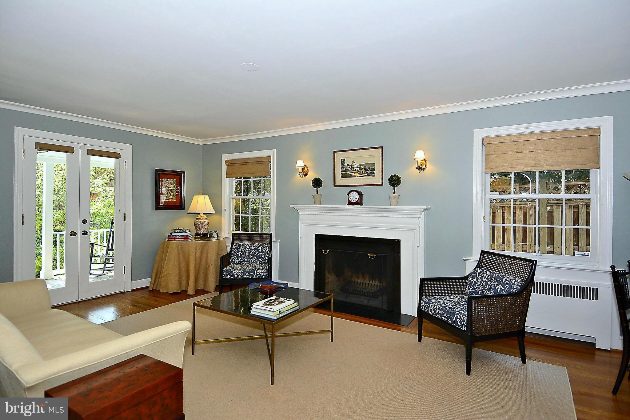 6428 Barnaby Street Northwest Washington, DC 20015 - Photo 7 of 30 LR w fireplace and French doors to front porch