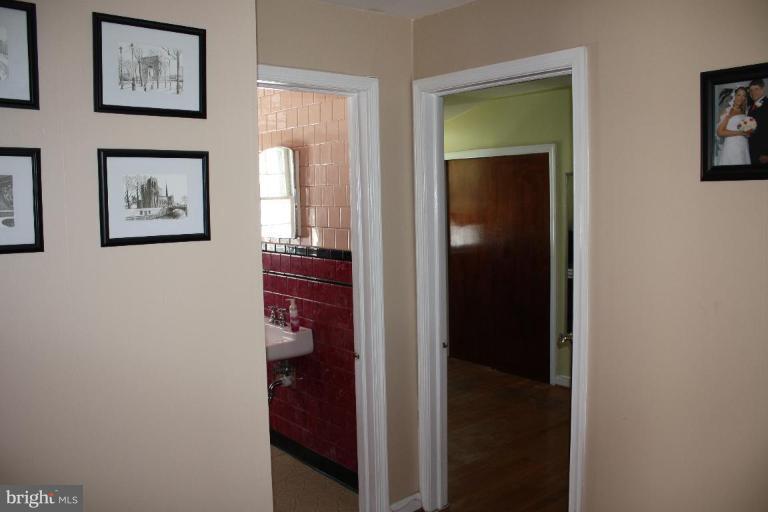 6506 Sharon Road Baltimore, MD 21239 - Photo 22 of 27 Upstairs hallway