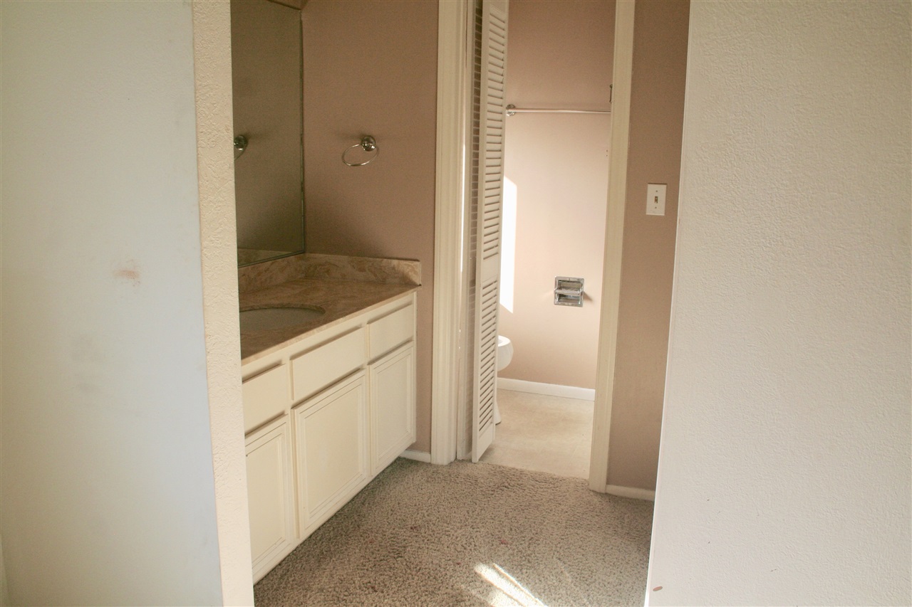 1941 Alga Road, Unit F Carlsbad, CA 92009 - Photo 8 of 22 Full bath in secondary bedroom