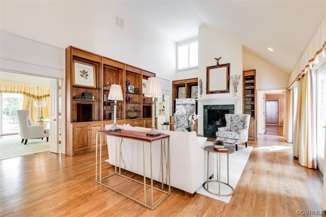 4600 Sulgrave Road Midlothian, VA 23114 - Photo 5 of 26 a living room with furniture a large window and a fireplace
