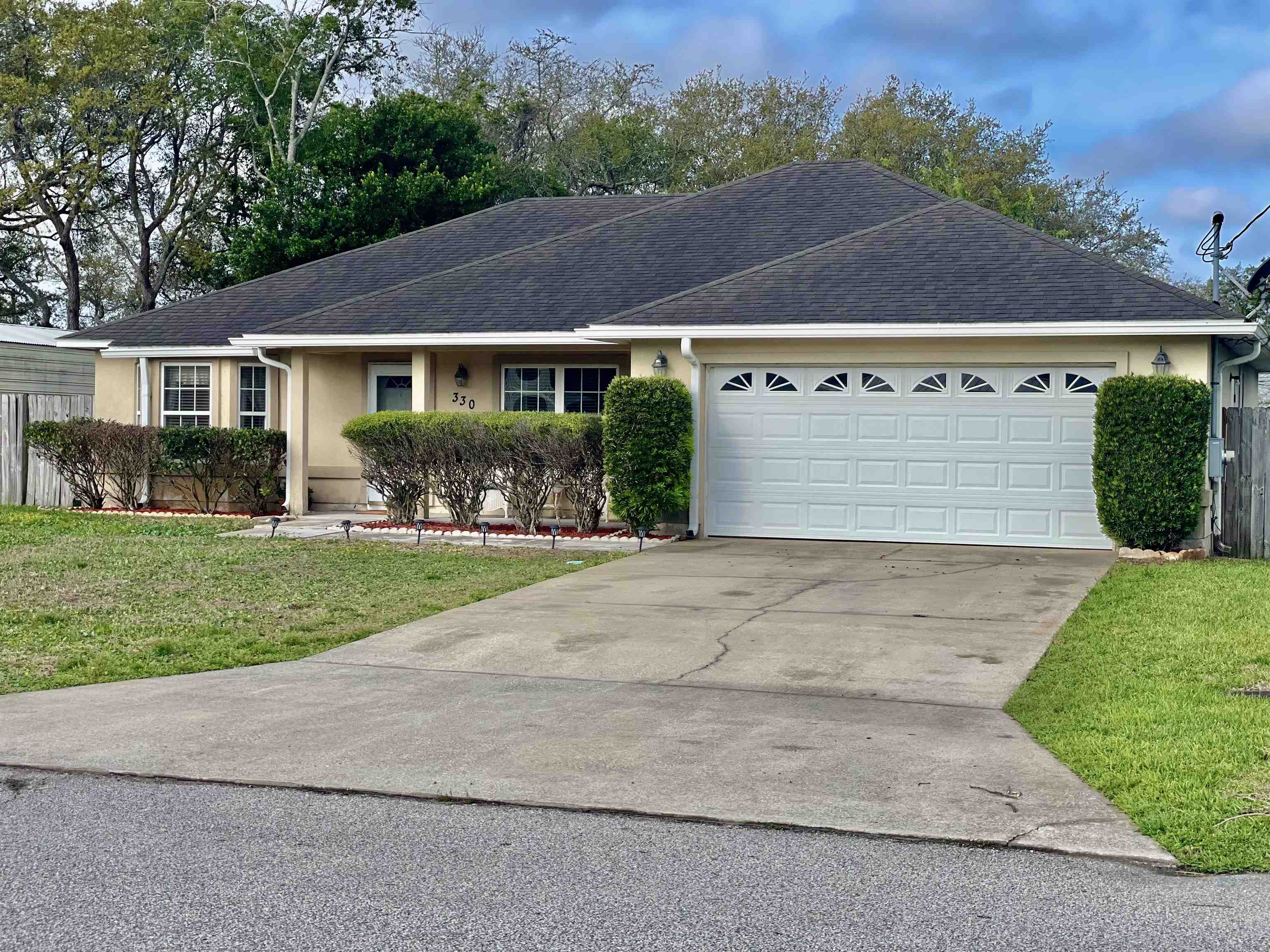 330 Segovia Road St. Augustine, FL 32086 - Photo 2 of 52 front view of house with a yard