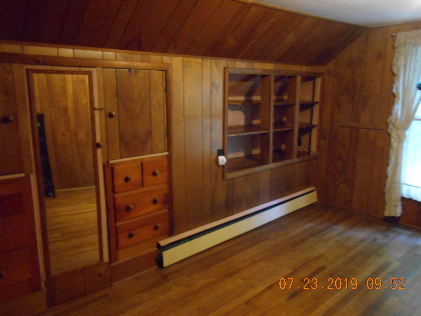 208 North 1st Street Ridge Farm, IL 61870 - Photo 17 of 23 an empty room with wooden floor and windows