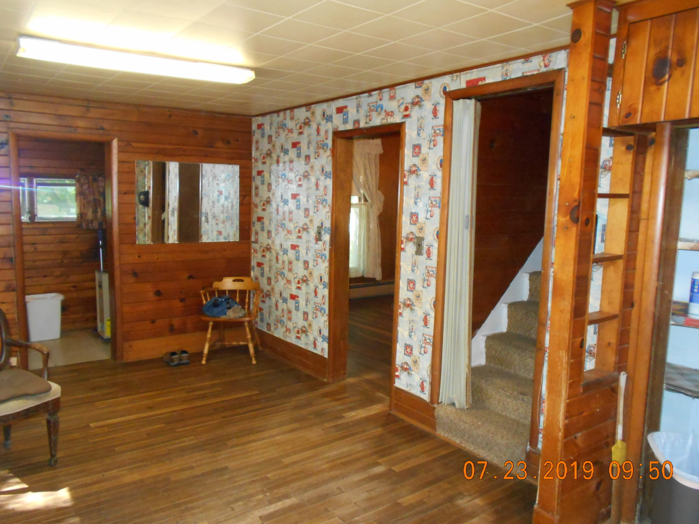 208 North 1st Street Ridge Farm, IL 61870 - Photo 8 of 23 a view of an entryway with wooden floor and furniture