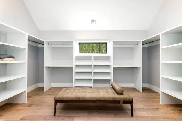 a view of a swimming pool with a yard