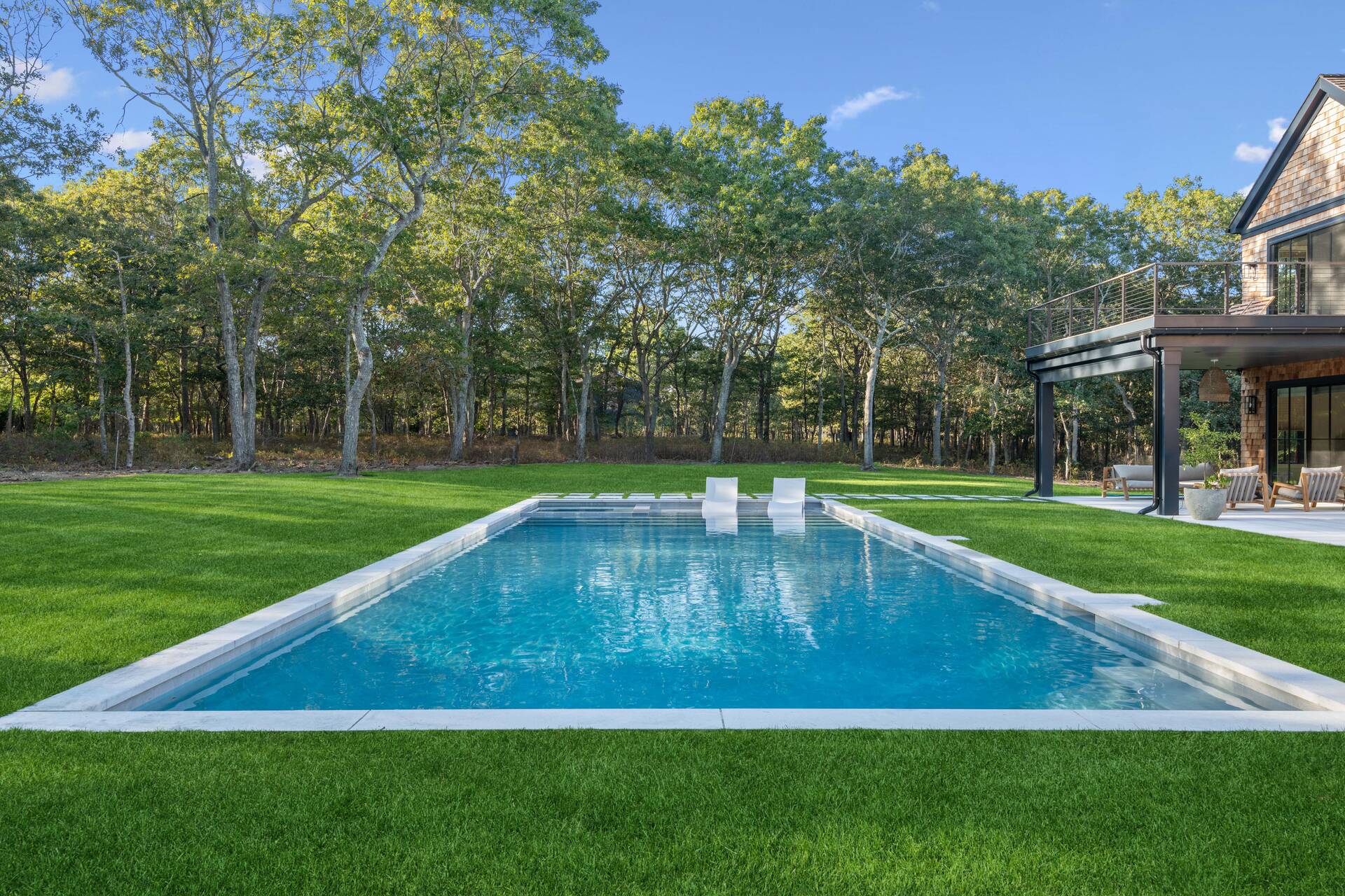 780 Sagg Road Sagaponack, NY 11962 - Photo 28 of 47 a view of a swimming pool with a yard