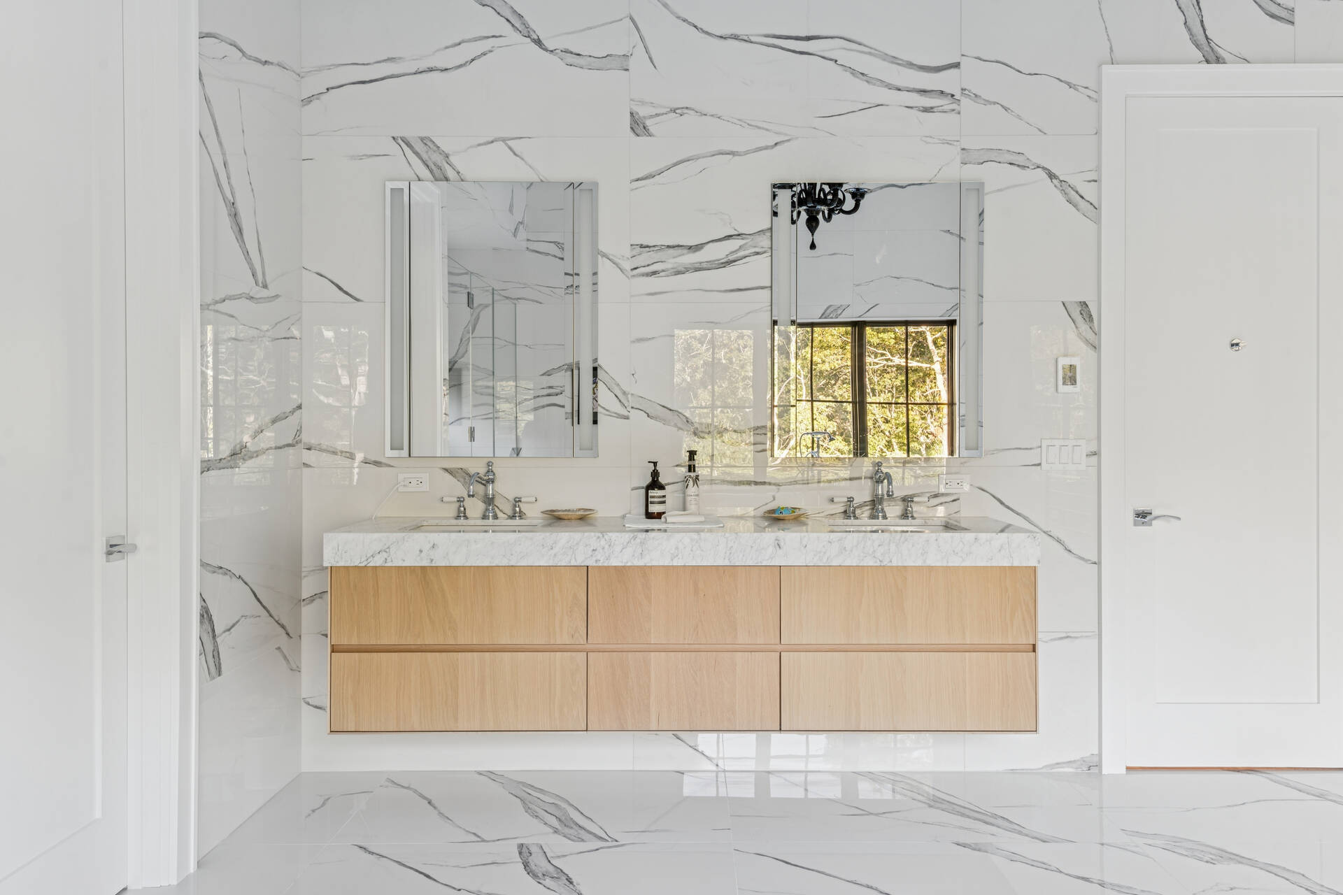 780 Sagg Road Sagaponack, NY 11962 - Photo 29 of 47 a bathroom with a sink vanity granite and a mirror