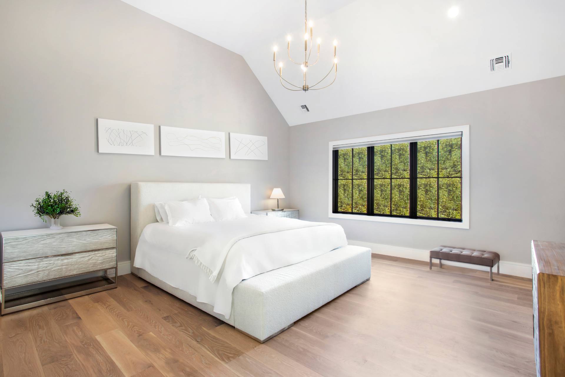 780 Sagg Road Sagaponack, NY 11962 - Photo 34 of 47 a bedroom with a large bed and a window