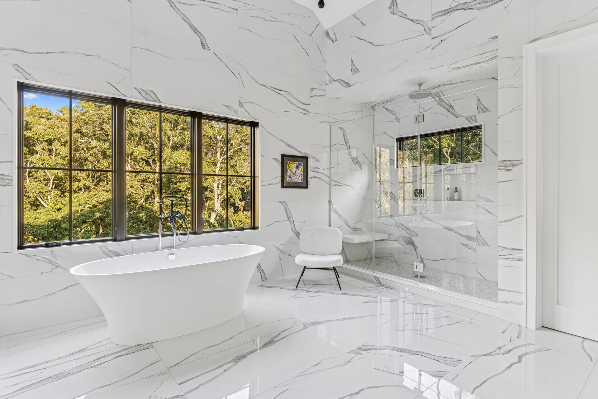 780 Sagg Road Sagaponack, NY 11962 - Photo 35 of 47 a bathroom with a bathtub and next to a window