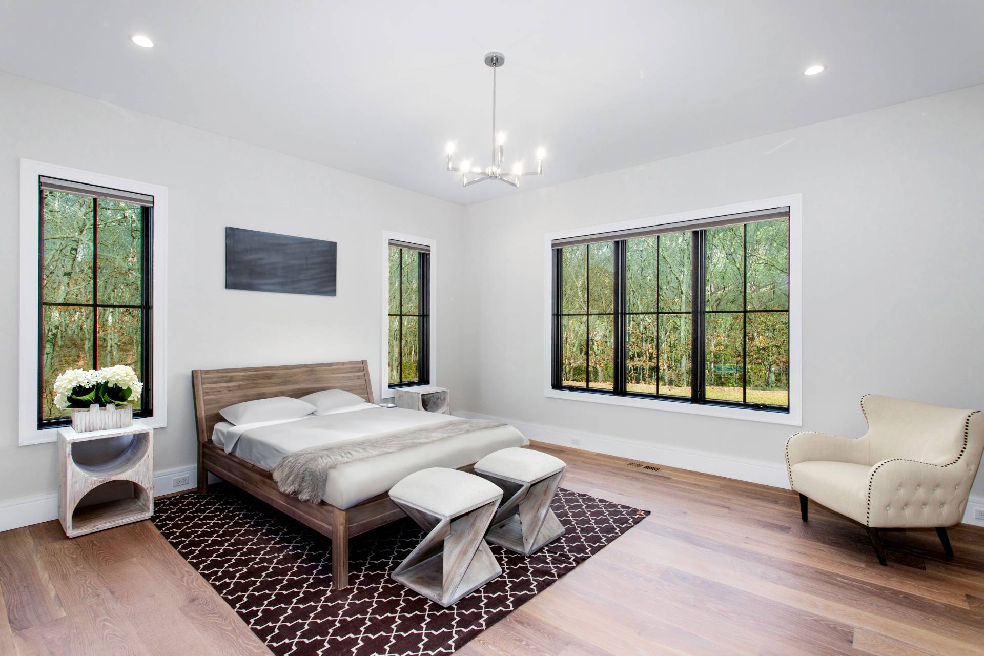 780 Sagg Road Sagaponack, NY 11962 - Photo 38 of 47 a bedroom with a bed and wooden floor