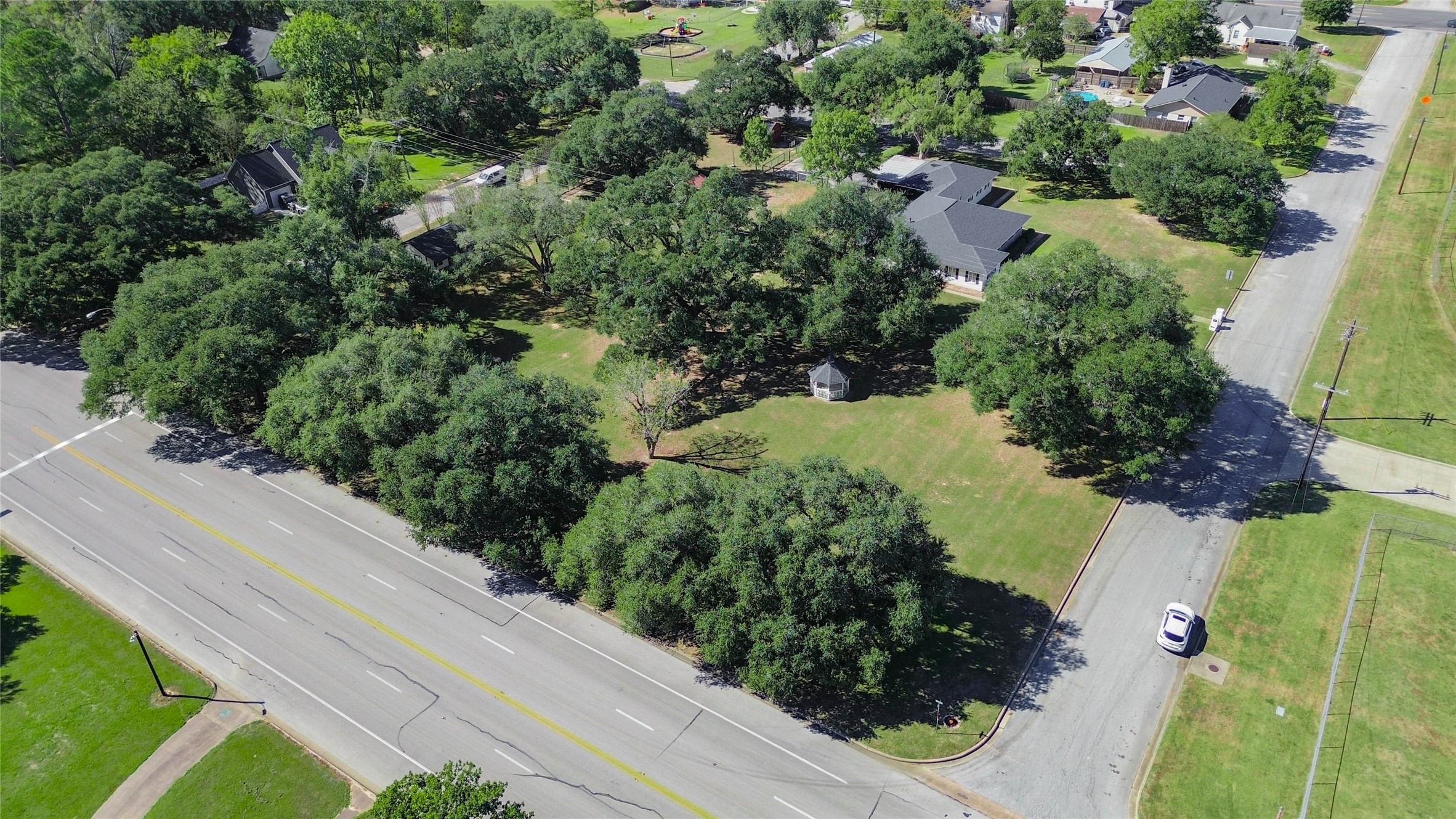 6-7 11th Street Hempstead, TX 77445 - Photo 2 of 10 an aerial view of a house with a yard