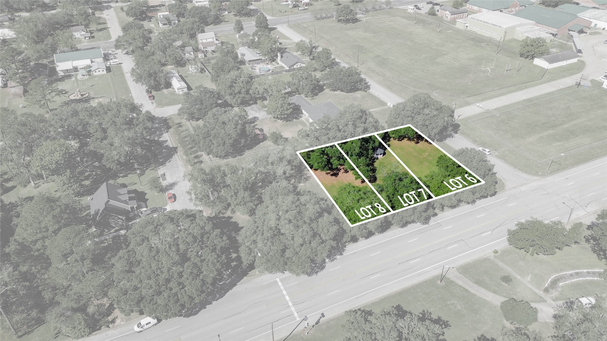 6-7 11th Street Hempstead, TX 77445 - Photo 3 of 10 a wooden bench sitting in the middle of a yard