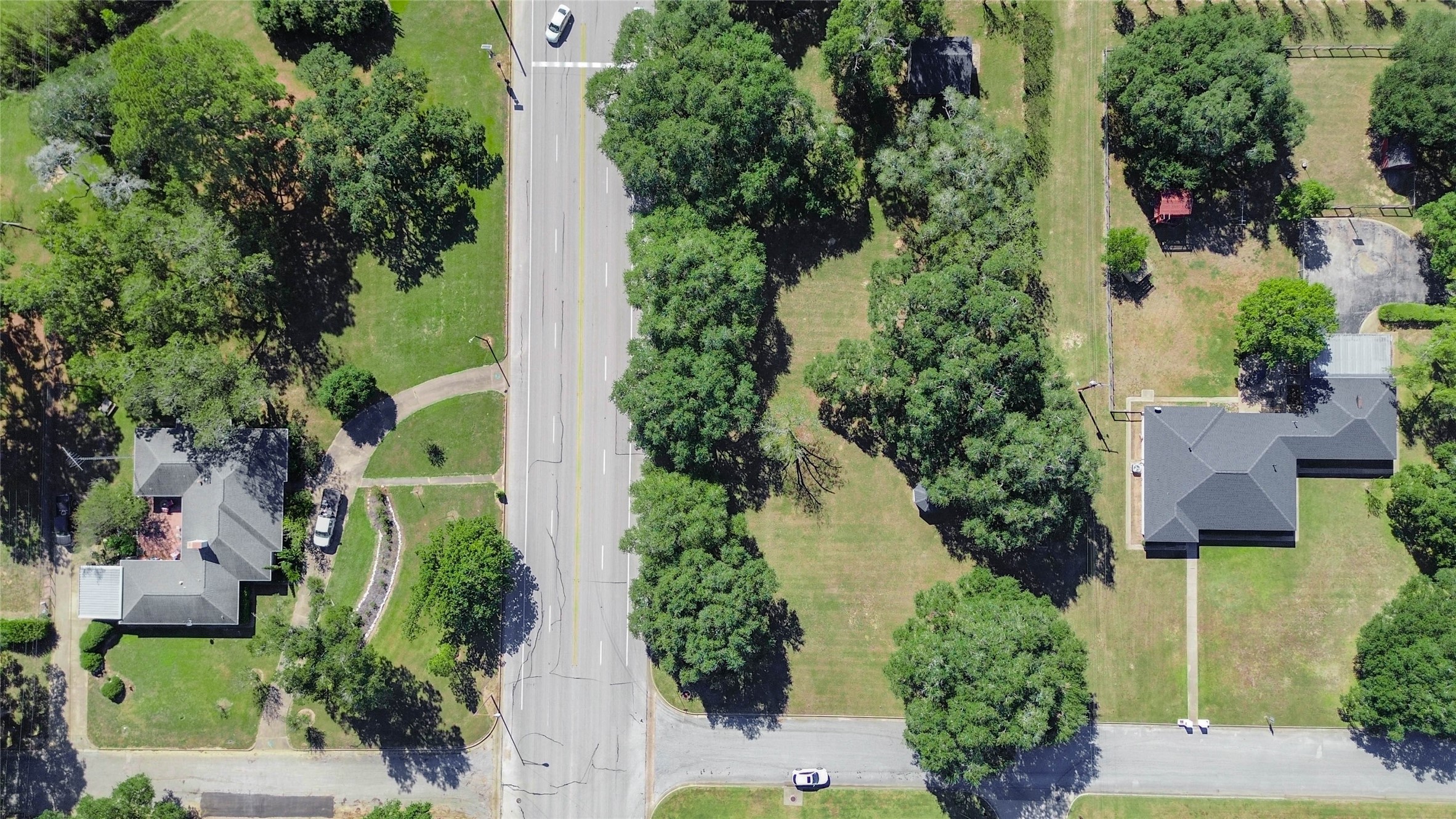 6-7 11th Street Hempstead, TX 77445 - Photo 7 of 10 an aerial view of residential house with outdoor space and trees all around