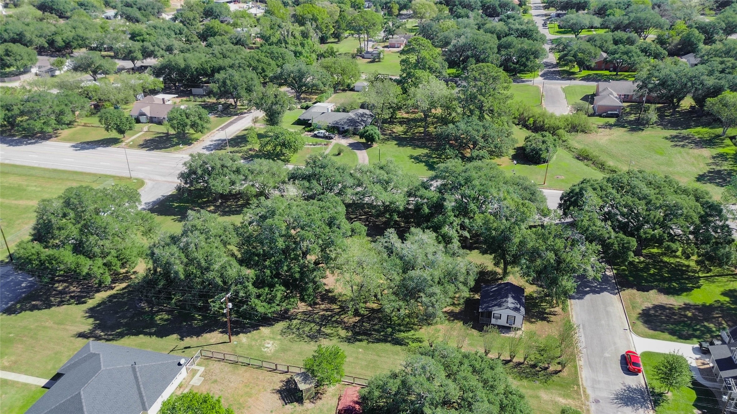 6-7 11th Street Hempstead, TX 77445 - Photo 10 of 10 an aerial view of a house with a yard