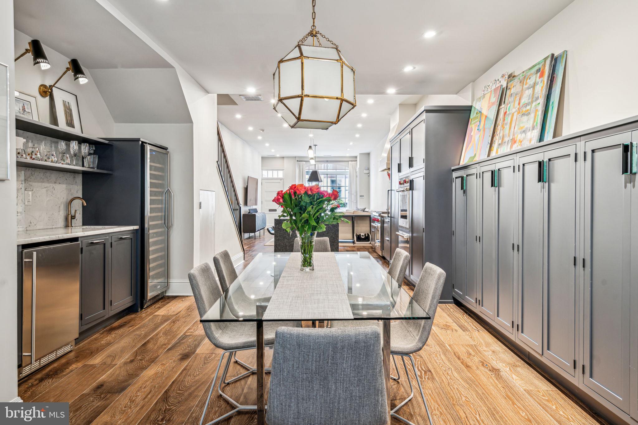 1710 Rittenhouse Square Philadelphia, PA 19103 - Photo 11 of 28 a view of a dining room with furniture and a chandelier