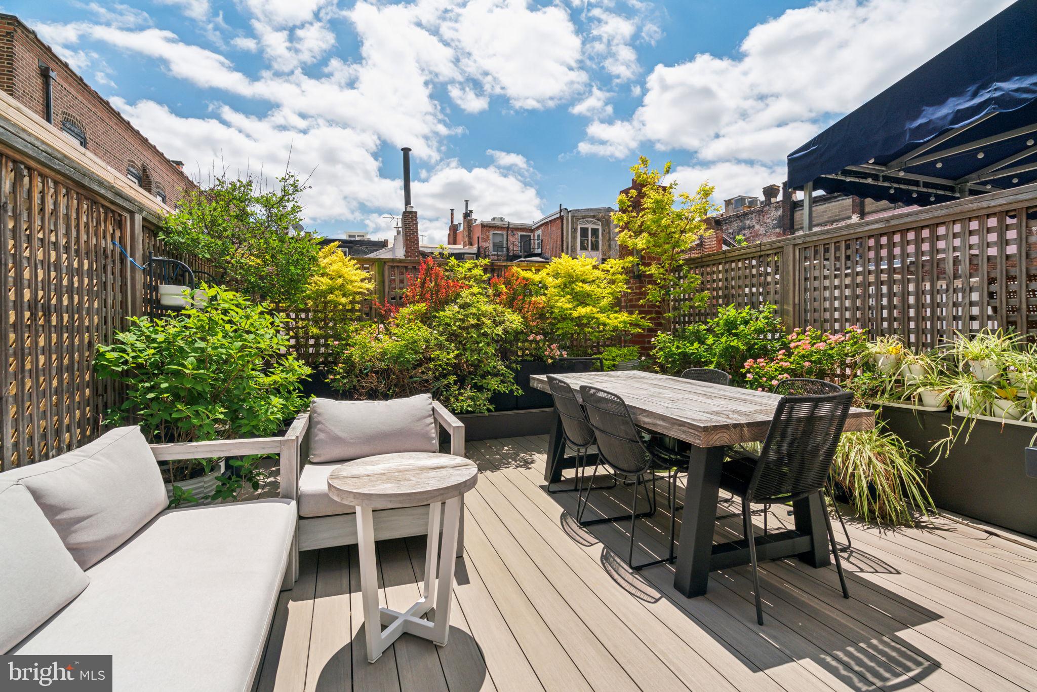 1710 Rittenhouse Square Philadelphia, PA 19103 - Photo 26 of 28 a view of a patio with table and chairs and potted plants