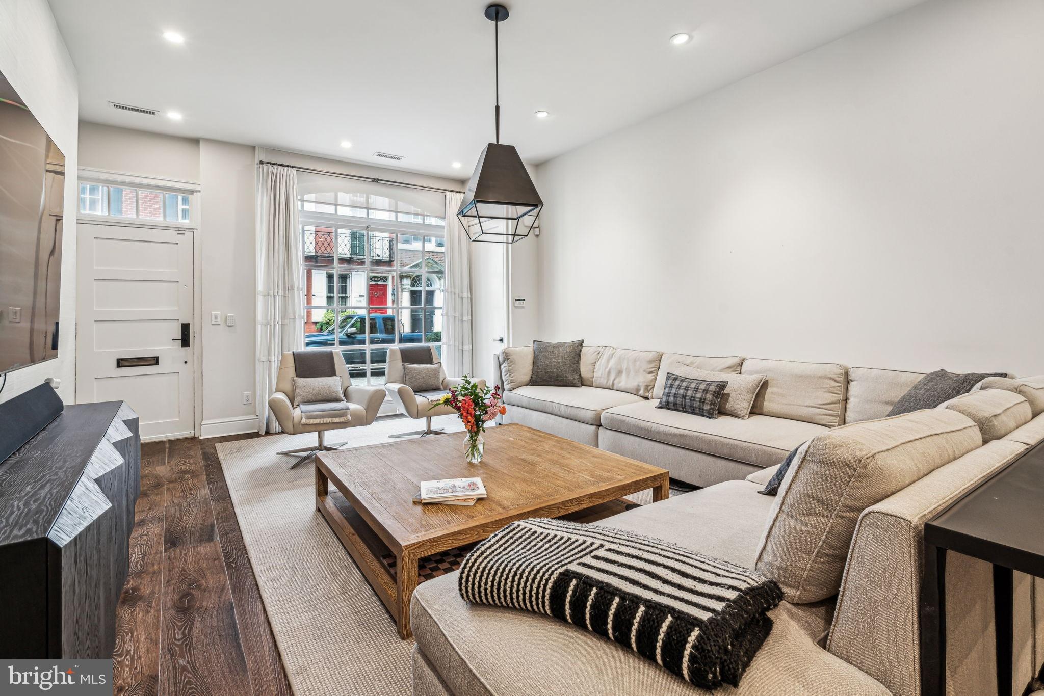 1710 Rittenhouse Square Philadelphia, PA 19103 - Photo 4 of 28 a living room with furniture and wooden floor