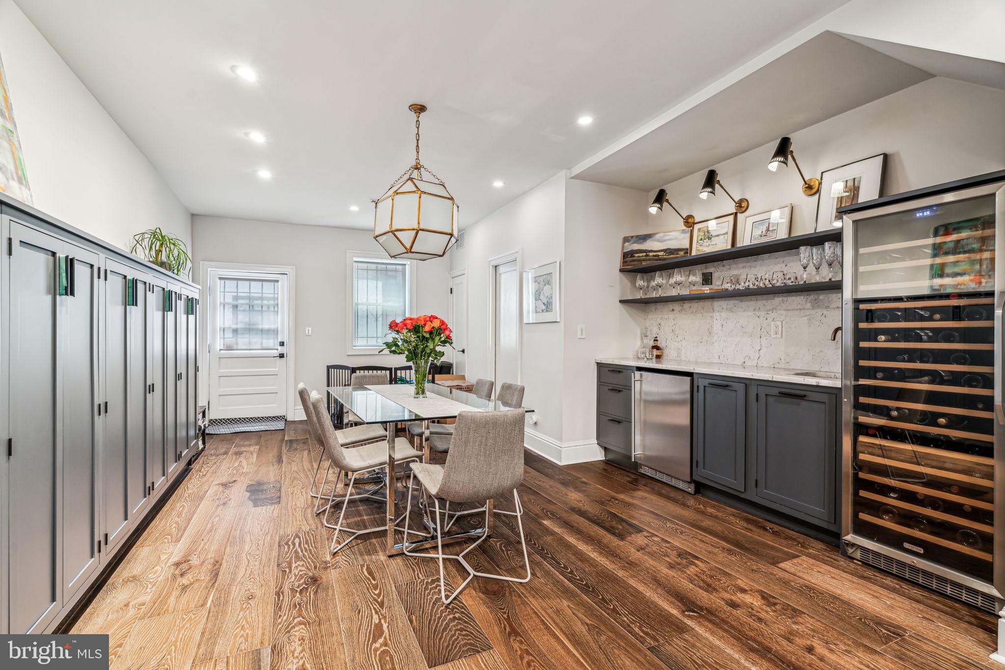 1710 Rittenhouse Square Philadelphia, PA 19103 - Photo 9 of 28 a view of a dining room with furniture window and wooden floor