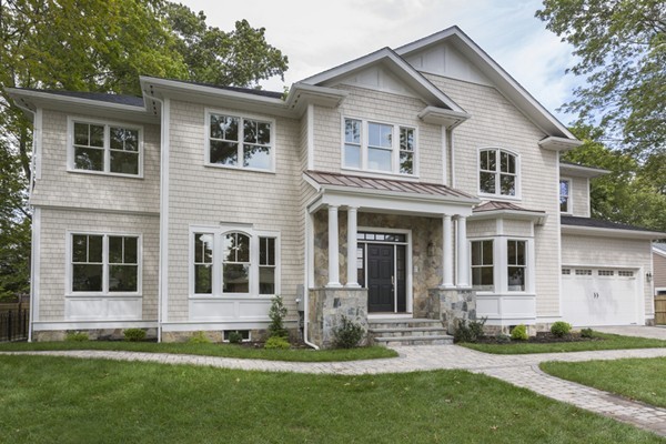 33 Sherbrooke Road Newton, MA 02458 - Photo 1 of 18 a front view of a house with a yard