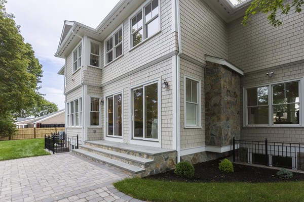 33 Sherbrooke Road Newton, MA 02458 - Photo 18 of 18 front view of a house with a yard