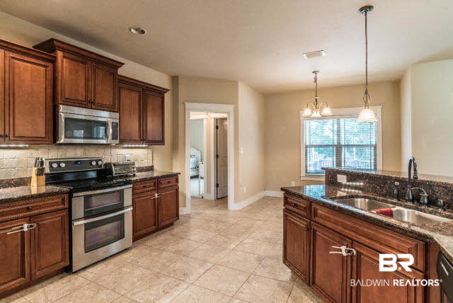 471 Dover Street Fairhope, AL 36532 - Photo 11 of 29 Nice stainless appliances with double oven smooth cooktop surface and built in microwave