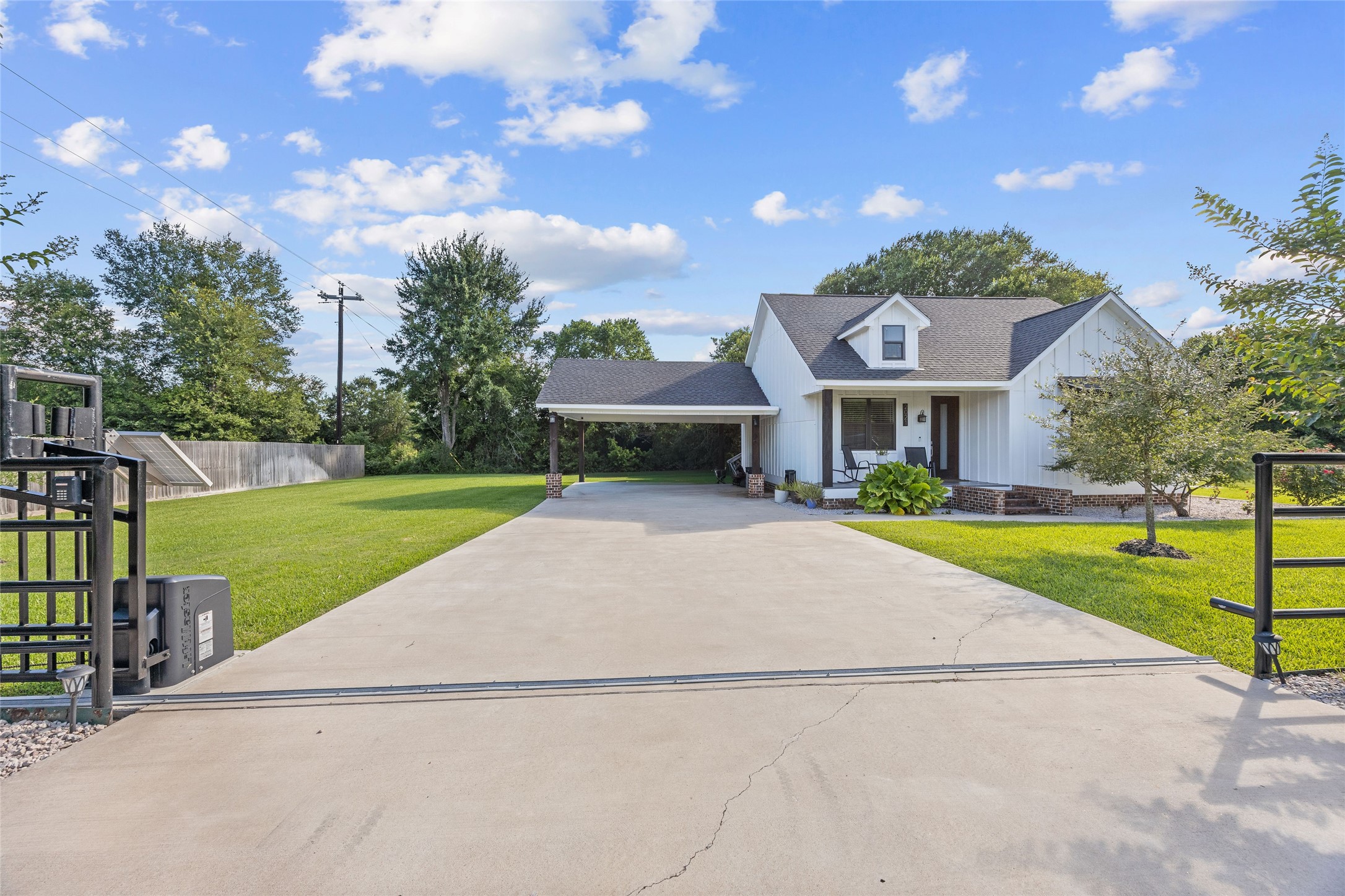 2021 Strangmeier Road Brenham, TX 77833 - Photo 2 of 16 Your stylish automatic gate allows you to protect your investment while providing a sense of safety and security.