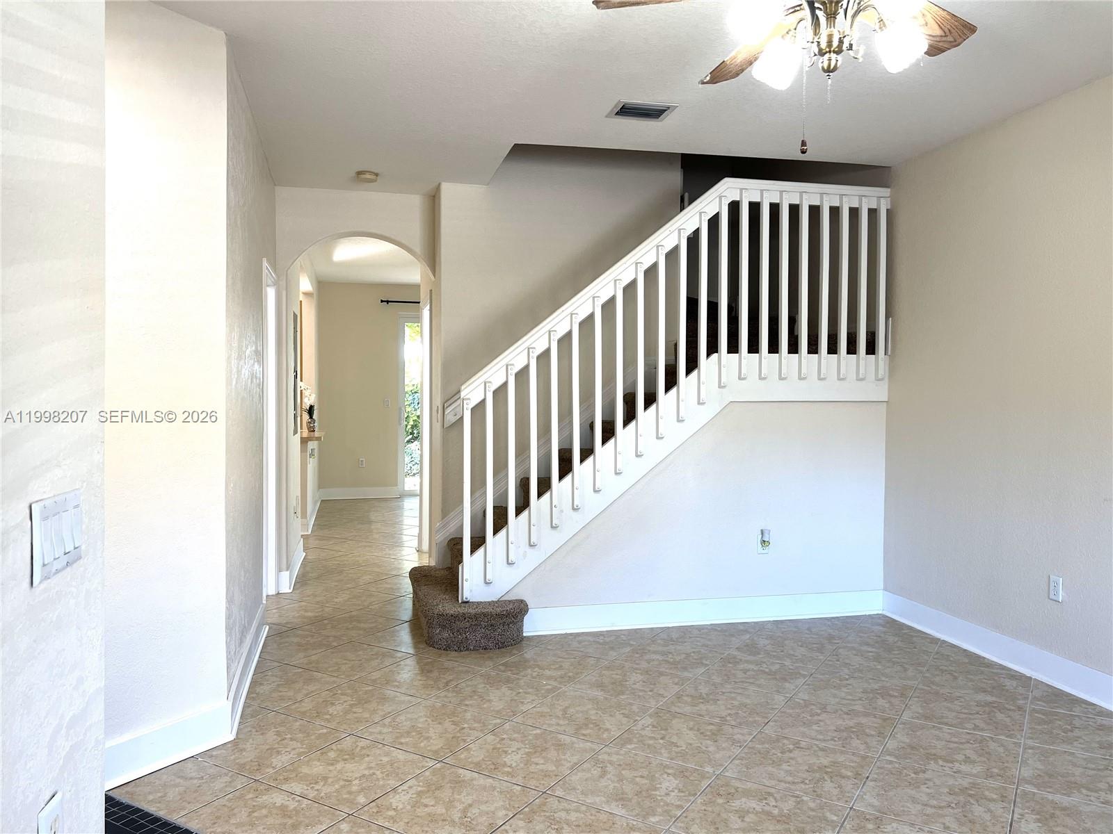 3377 Merrick Lane, Unit 707 Margate, FL 33063 - Photo 2 of 33 en view interior of a house with stairs
