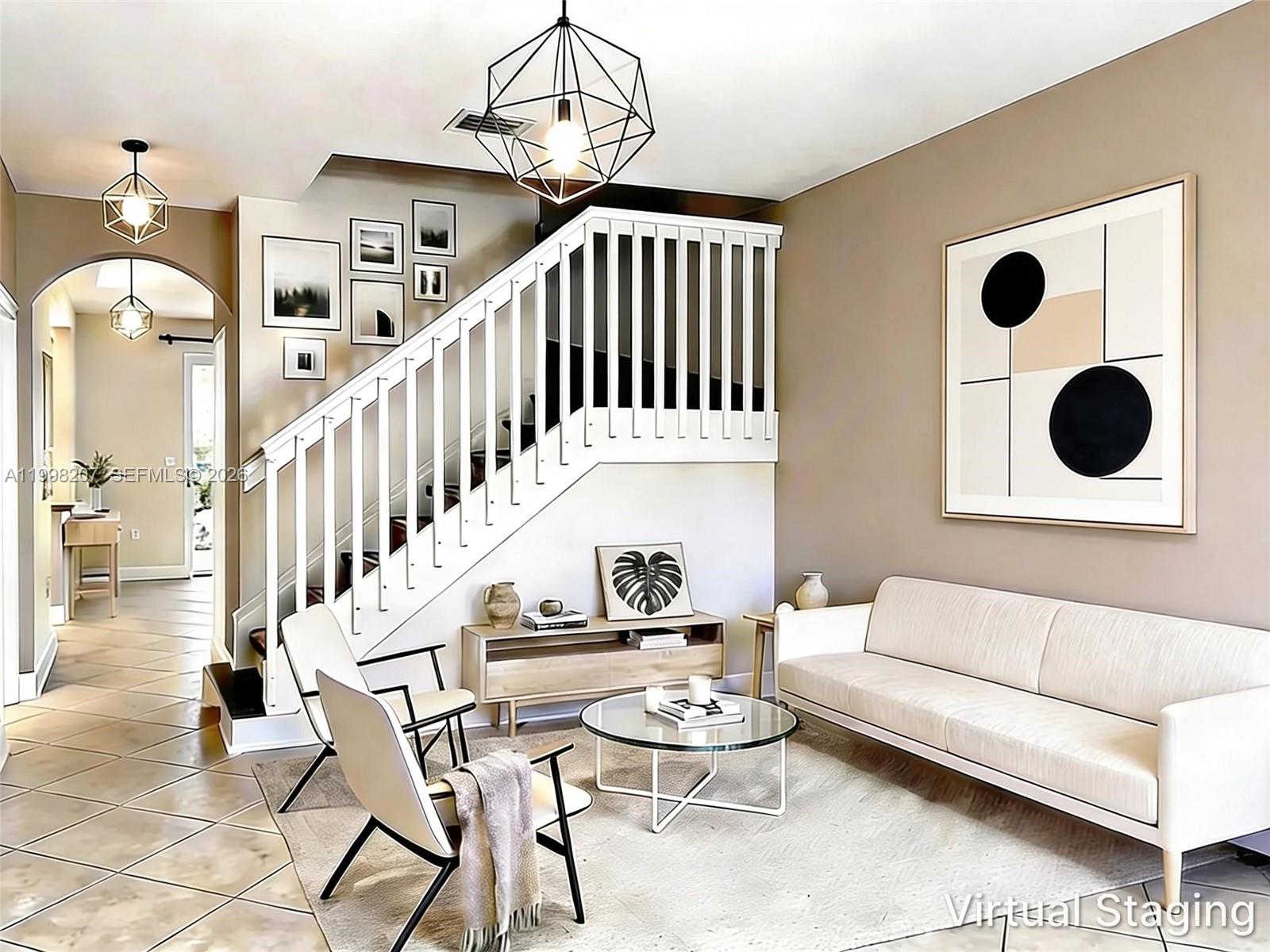 3377 Merrick Lane, Unit 707 Margate, FL 33063 - Photo 3 of 33 a living room with furniture and a chandelier
