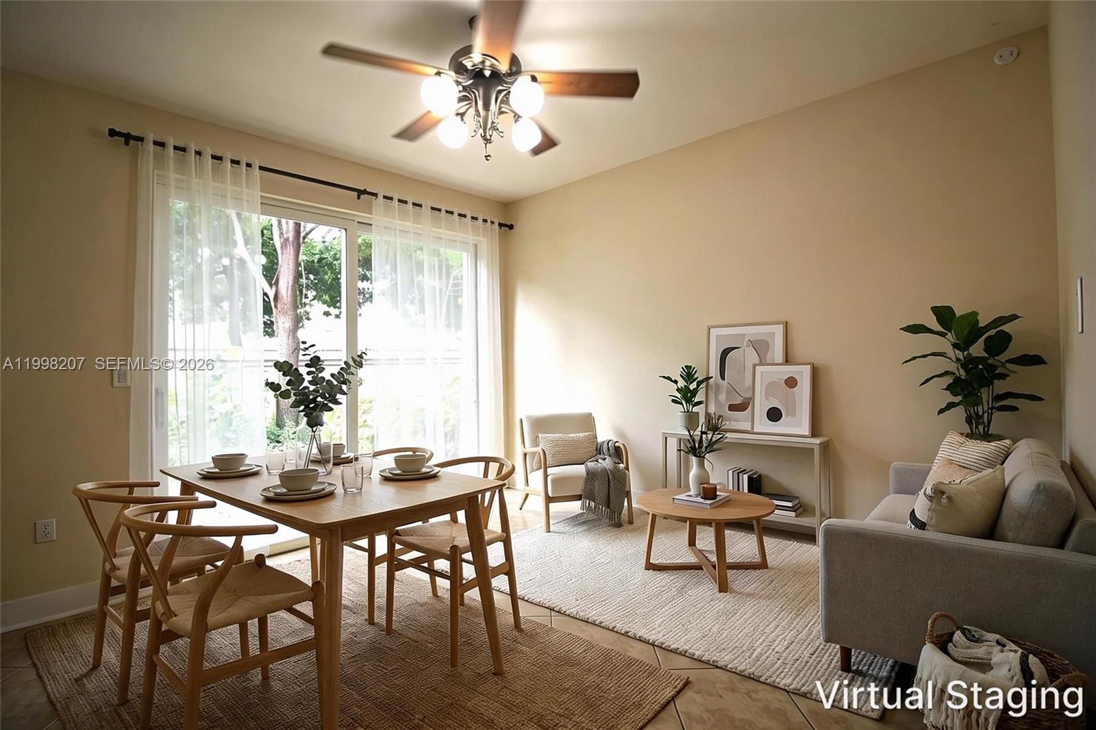 3377 Merrick Lane, Unit 707 Margate, FL 33063 - Photo 8 of 33 a living room with furniture and a large window