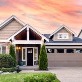front view of a house and a yard