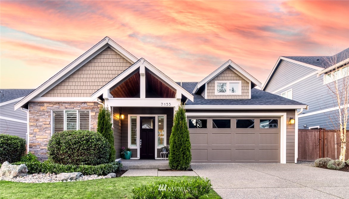 front view of a house and a yard