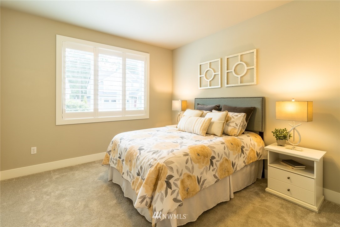 7155 Teal Loop Gig Harbor, WA 98335 - Photo 11 of 40 a bedroom with a bed and a window