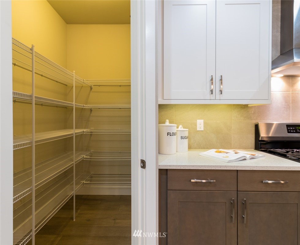 7155 Teal Loop Gig Harbor, WA 98335 - Photo 22 of 40 a bathroom with a sink and a mirror
