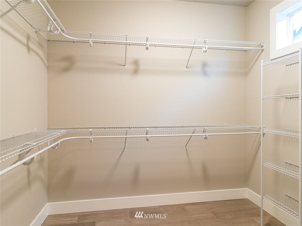 7155 Teal Loop Gig Harbor, WA 98335 - Photo 34 of 40 a view of a room with racks on the wall