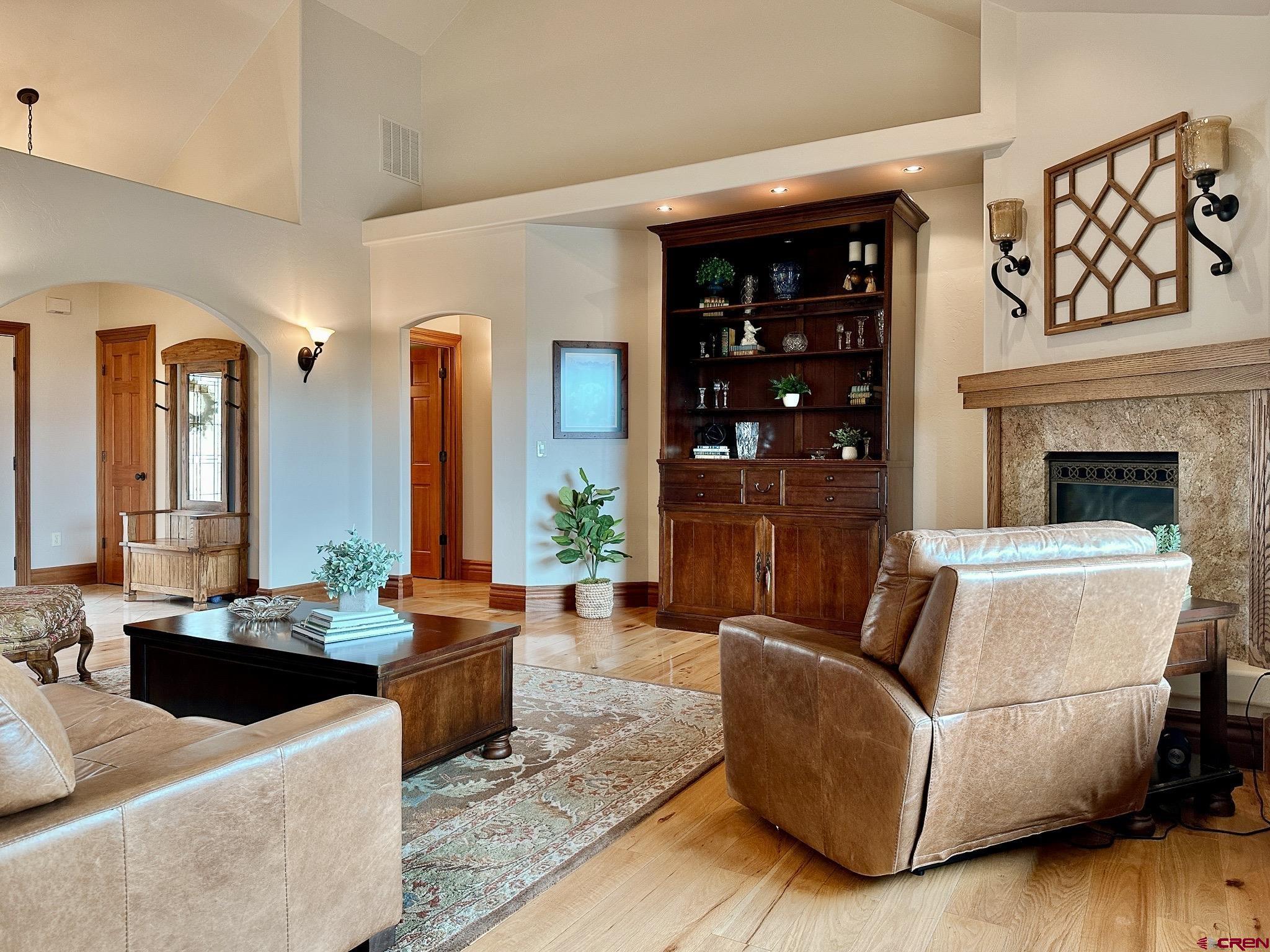 1787 Roubideau Street Delta, CO 81416 - Photo 11 of 35 a living room with furniture and fireplace